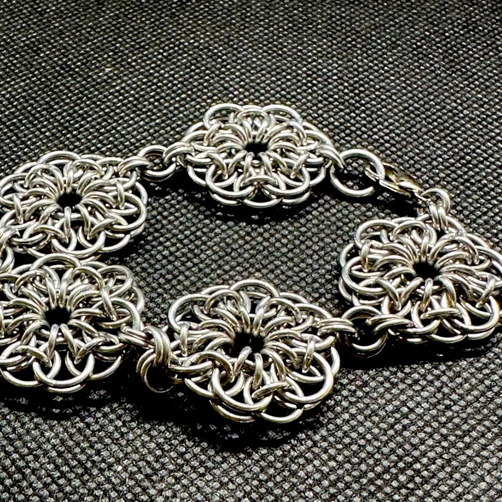 All swirls bracelet, silver toned
